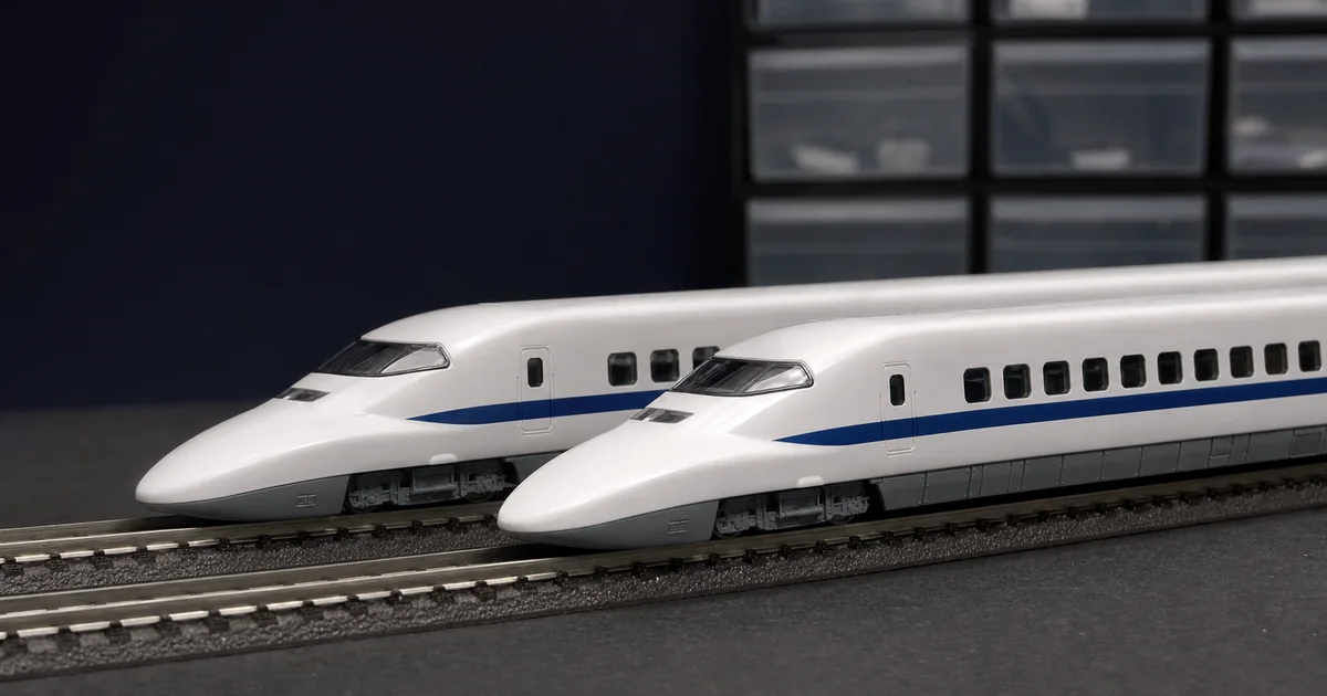 兩列白色藍帶低鼻高速列車模型的工作台比較情境